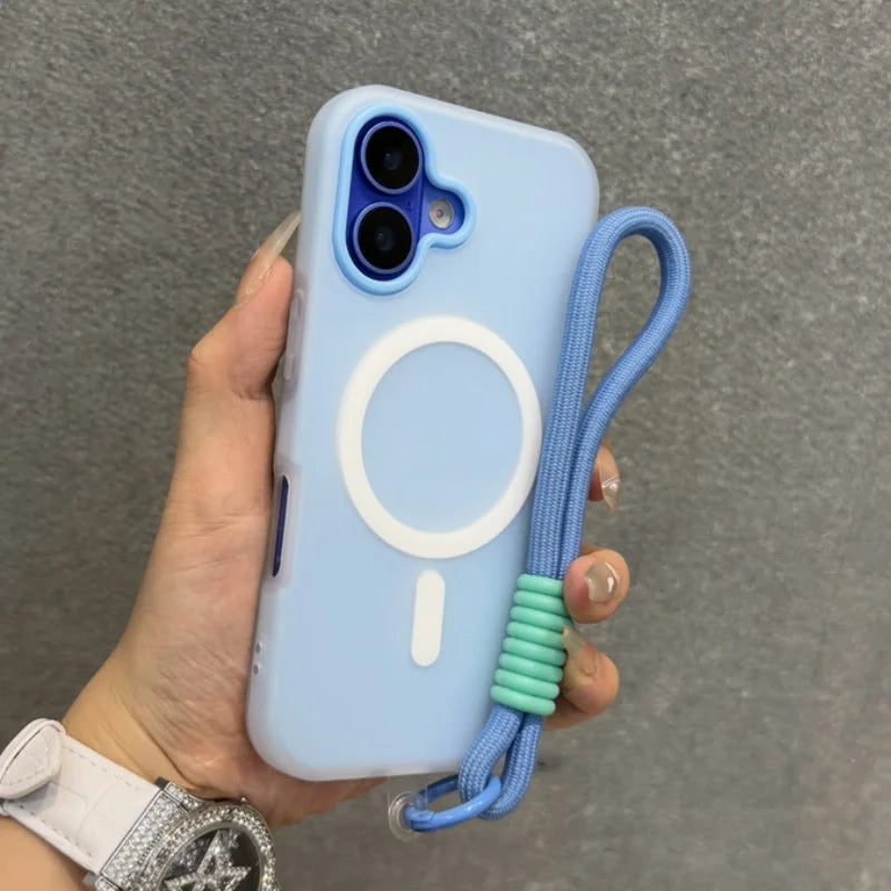 Light blue iPhone case with a white MagSafe ring, a camera bump, and an attached blue wrist strap with mint green beads.
