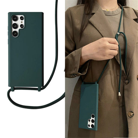 Dark green silicone phone case with an attached long strap for hands-free carrying.