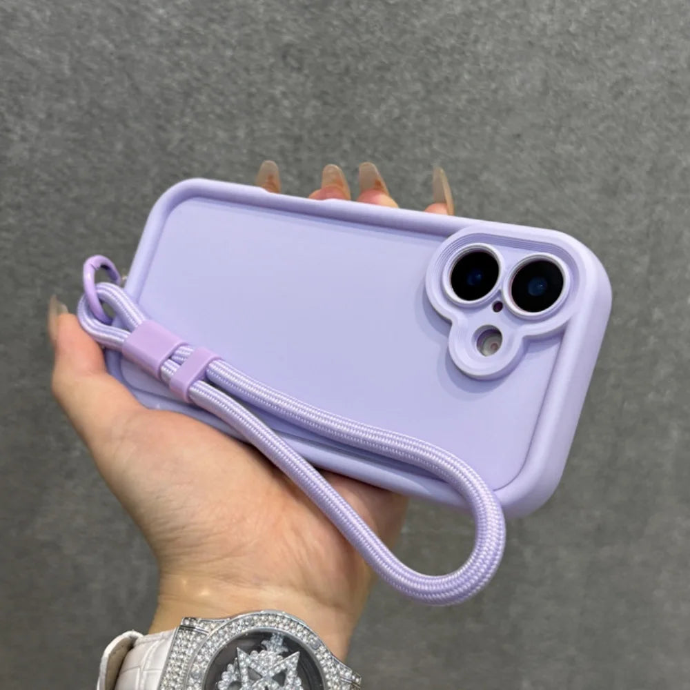 Lavender silicone phone case with a wrist strap.
