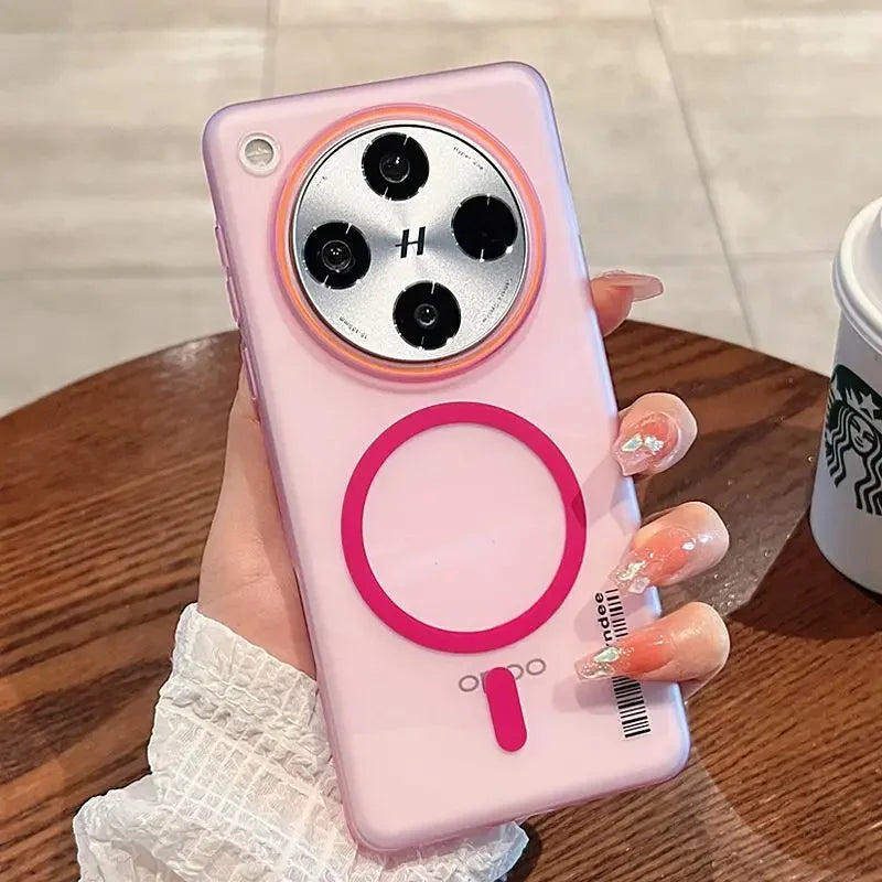 Pink smartphone with a prominent circular camera module and a magnetic ring on the back.