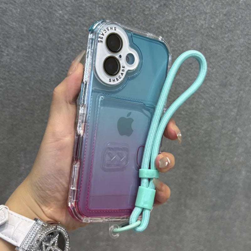 A clear phone case with a blue and purple gradient, featuring a white camera protector and an attached mint green wrist strap.