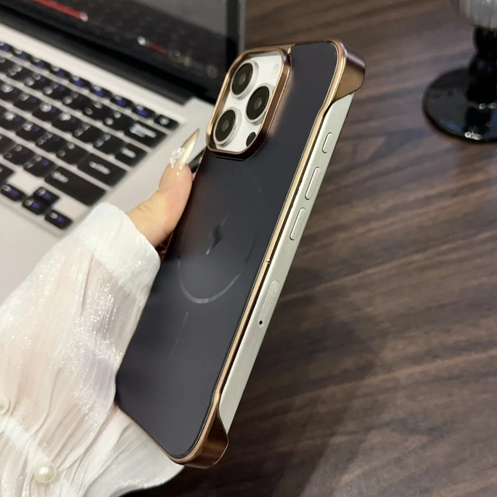 A dark-colored smartphone with a transparent back, a gold protective bumper case, and a triple-lens camera system.