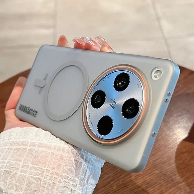 Grey smartphone case with a large circular camera cutout and a magnetic ring.