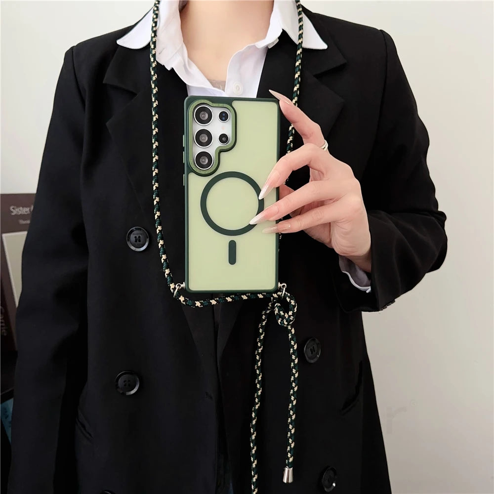Pale green phone case with a black cord strap.
