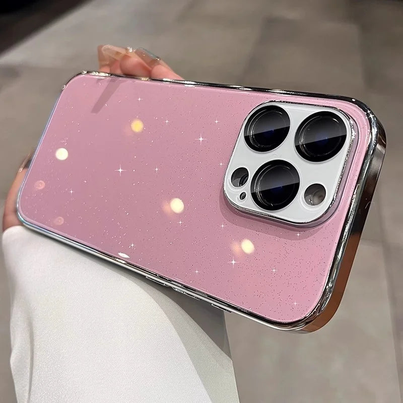 Pink glitter phone case with a silver frame and camera lens protector.