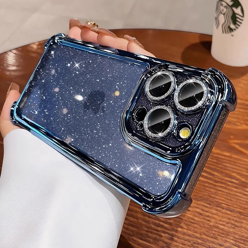 A glittery, blue-toned iPhone case with reinforced corners and rhinestone-encrusted camera lens protectors.