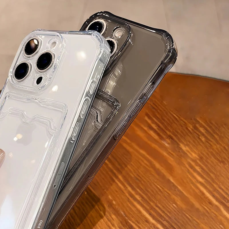 Two clear silicone phone cases, one transparent and one smoked gray, designed for iPhone models with triple camera systems.