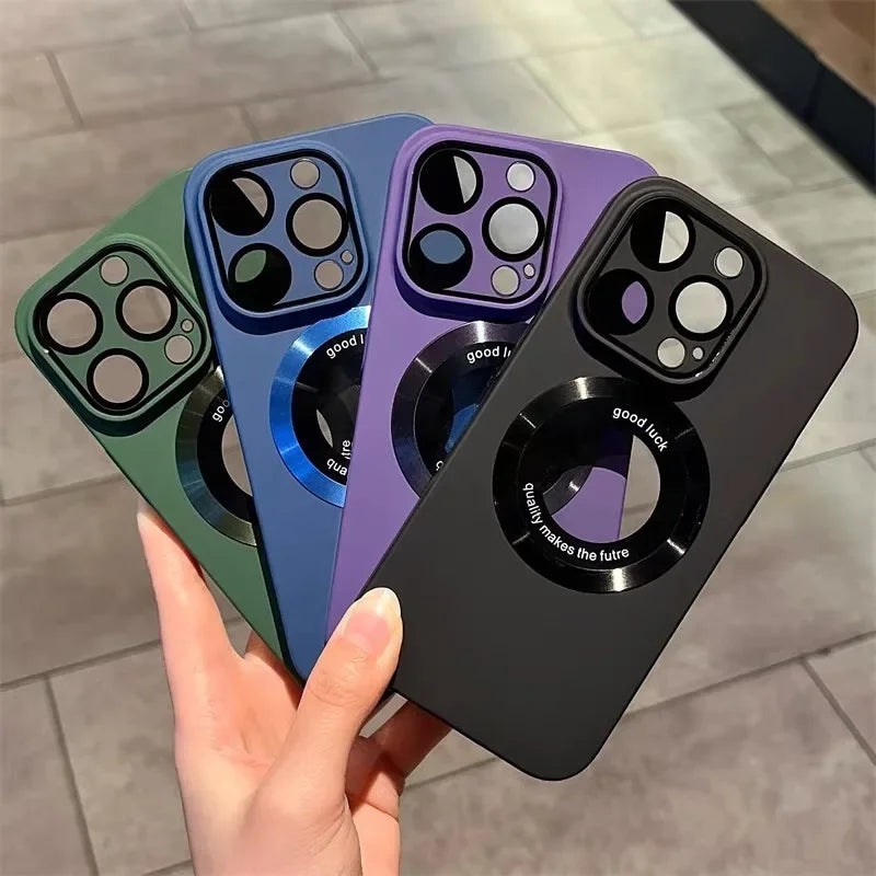 A set of four colorful smartphone cases with camera cutouts and a circular magnetic accessory.