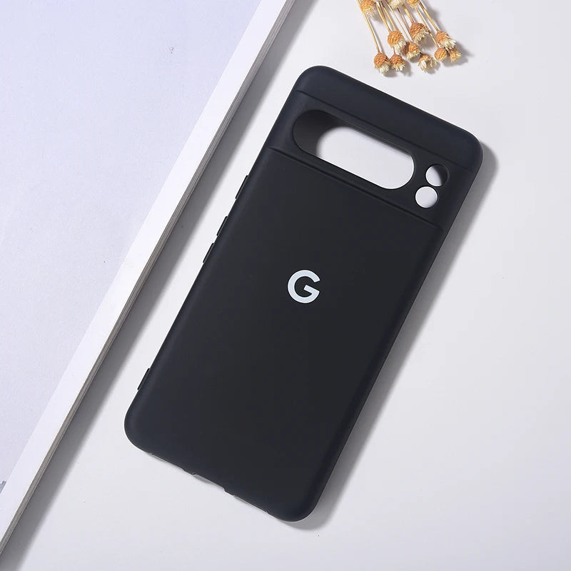 Black silicone phone case with camera cutouts and a ’G’ logo.