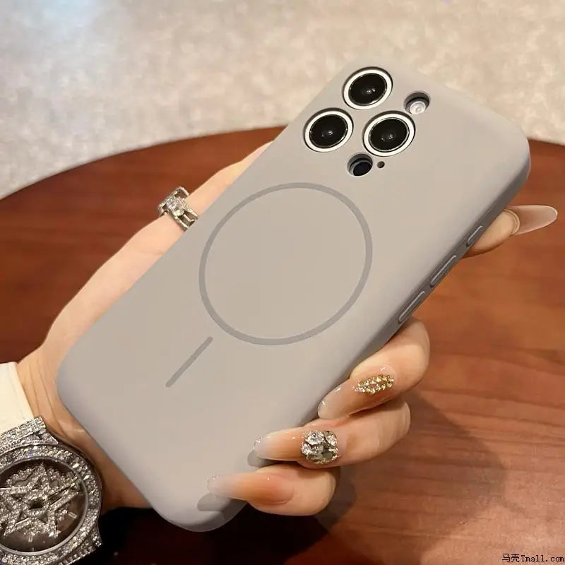 Gray silicone phone case for iPhone with MagSafe ring.
