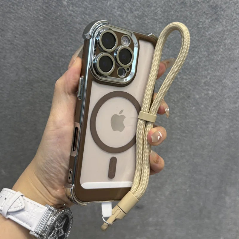 Clear iPhone case with chrome edges, a MagSafe ring, and an attached beige lanyard.