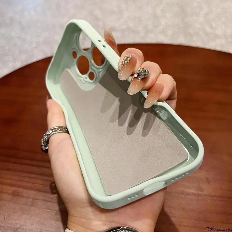 Light green silicone phone case with a soft grey interior lining.