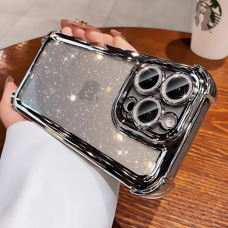 Glittery clear phone case with a chrome finish and jeweled camera lens protectors.