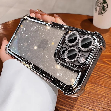 Sparkly clear phone case with a shiny silver bumper and embellished camera rings.