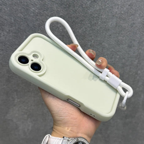 Light green smartphone case with a white wrist strap.