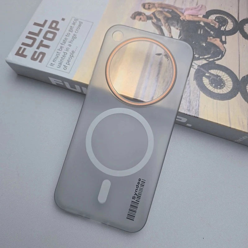 Translucent phone case with a circular camera cutout and a MagSafe ring.