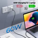 a laptop with a charger and a power cord