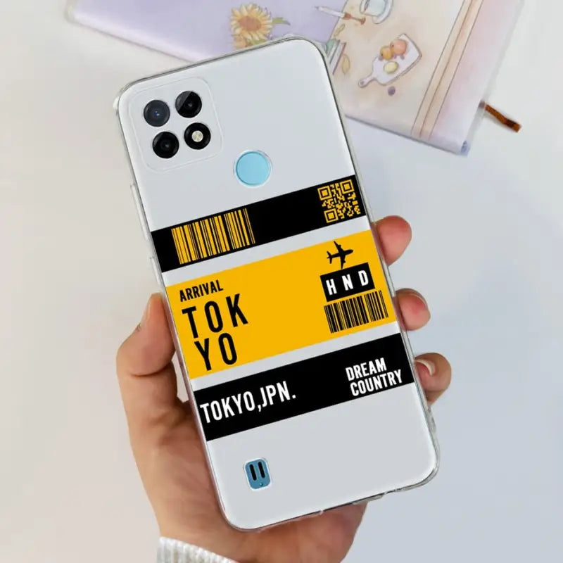 a person holding a phone case with a barcode