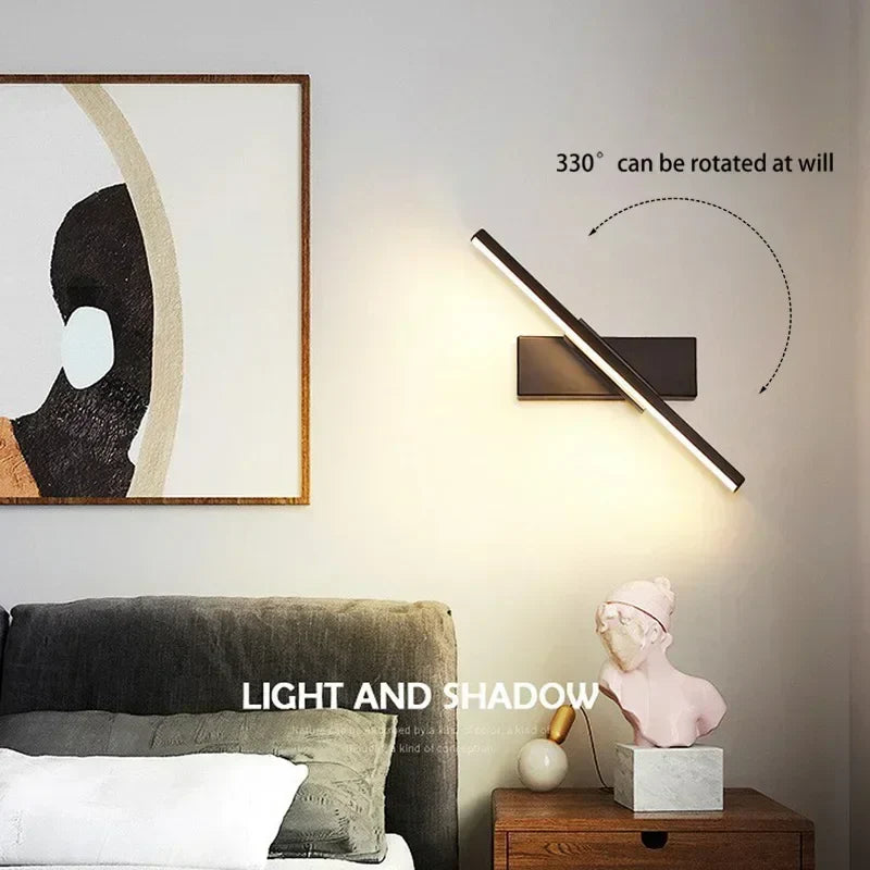 a bed with a painting on the wall above it