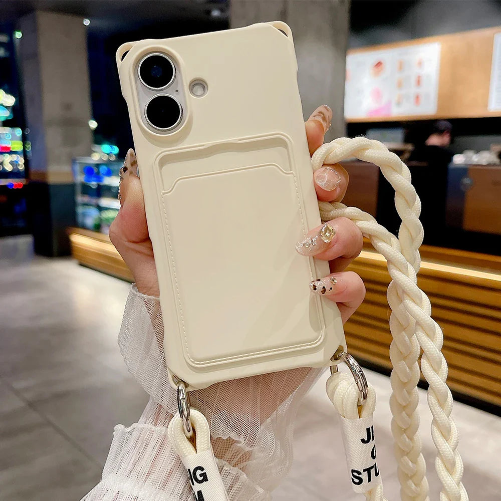 Beige phone case with card holder and braided strap.