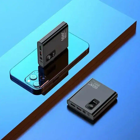 a black and blue device with a charging cable