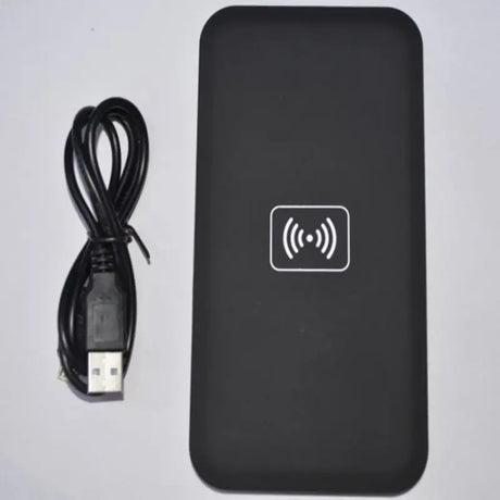 a black box with a usb and a cable