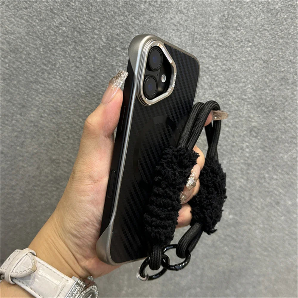 Black carbon fiber phone case with a fluffy wrist strap.