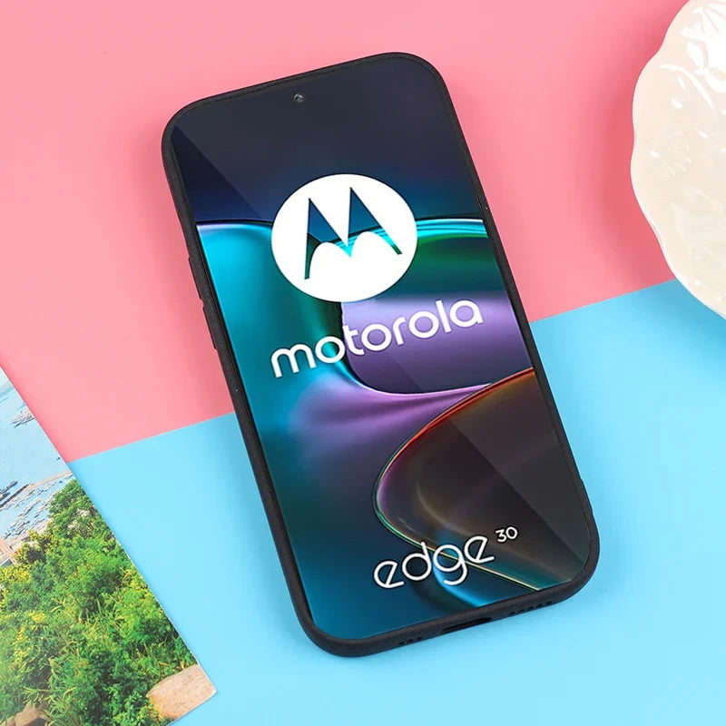 Black-cased Motorola smartphone.