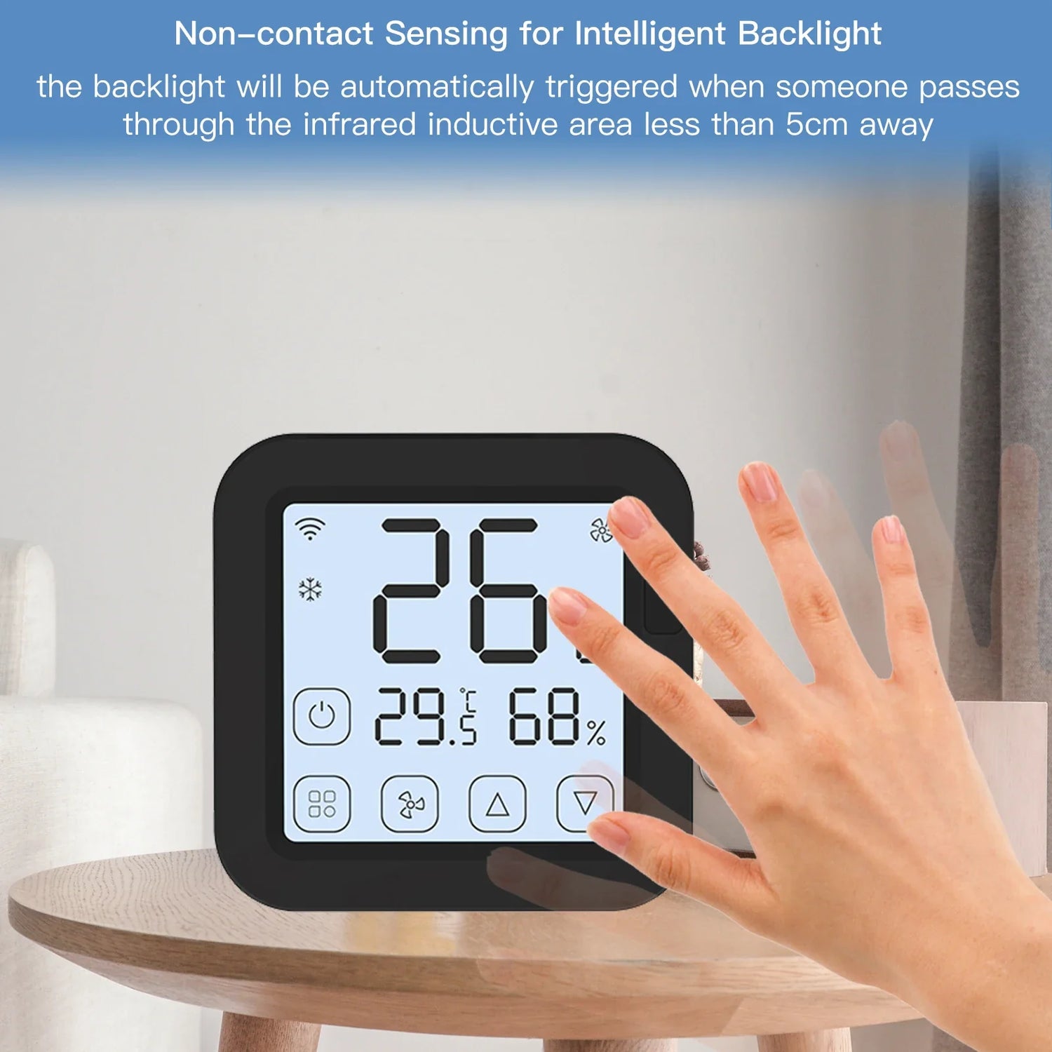 Black digital thermostat with hand.