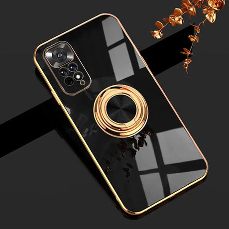 a black and gold phone case with a gold ring