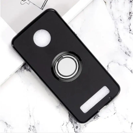 a black phone case with a ring on it