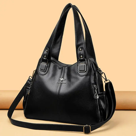 a black leather handbag with a zipper closure