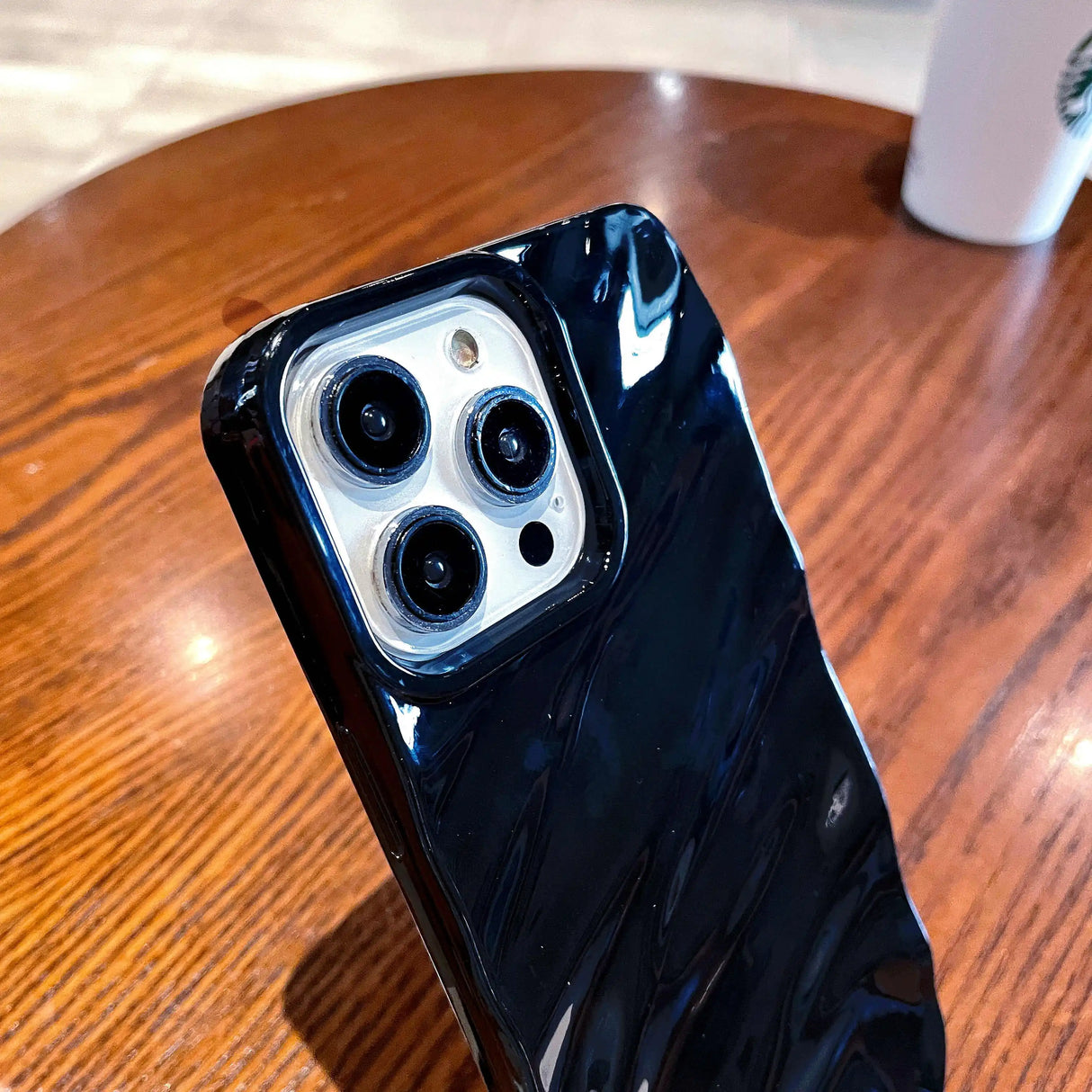 Black marble-patterned phone case.