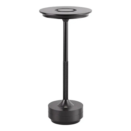 The black metal table base with a round base