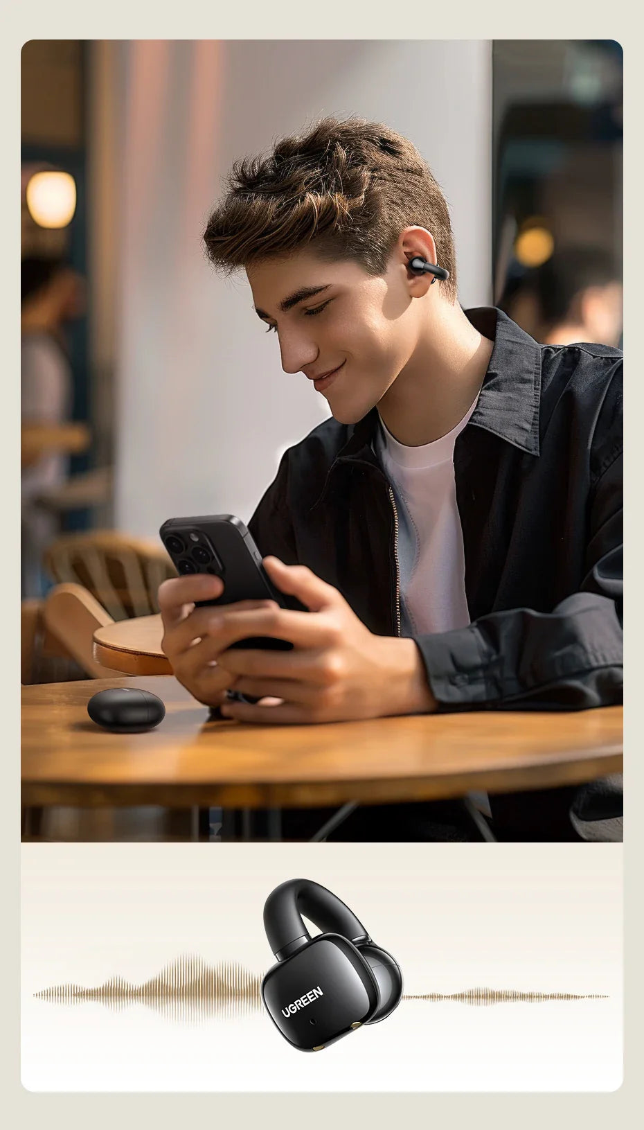 Black over-ear wireless earbud.