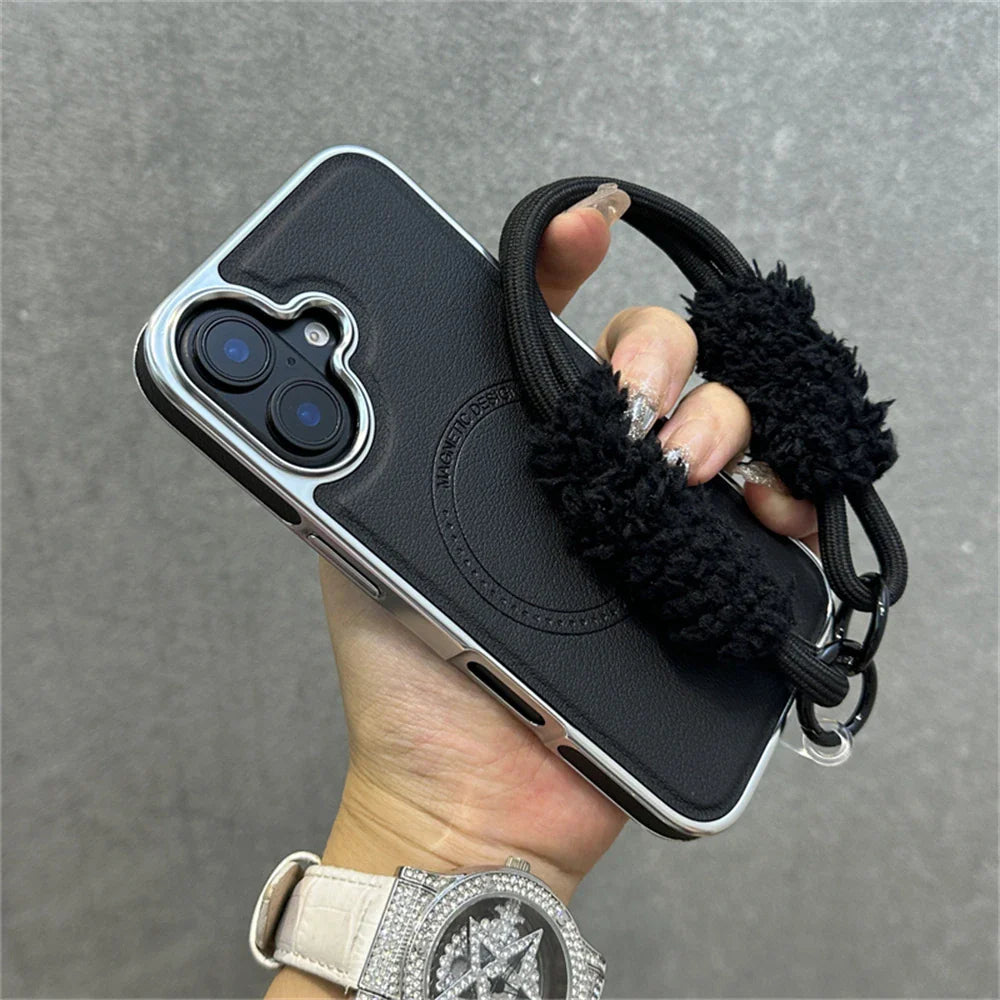Black phone case with fluffy strap.