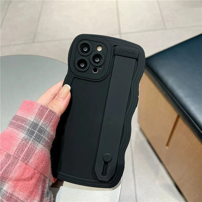 Black phone case with hand strap.