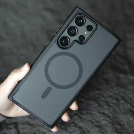 The back of a black phone case with a black logo on it