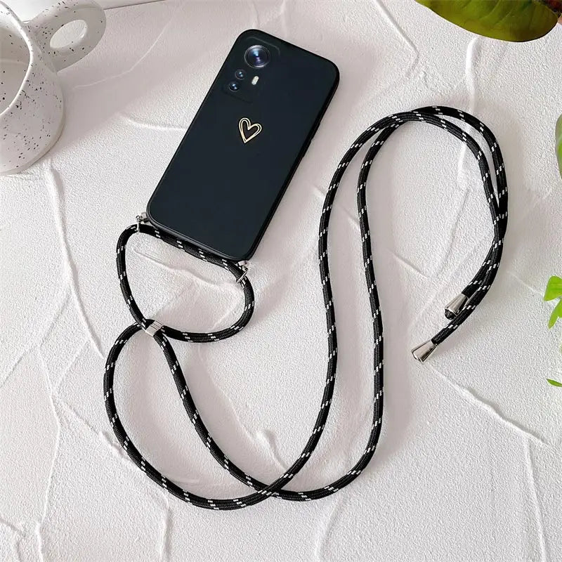 A black phone case with a black and white pattern on it