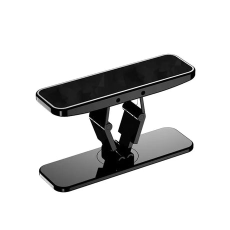 a black phone stand with a phone on top