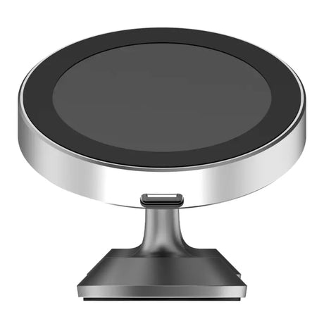 a black and silver phone stand with a black surface