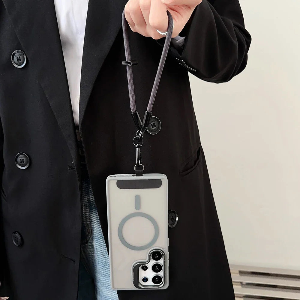 Black smartphone lanyard with a clear, MagSafe-compatible case.