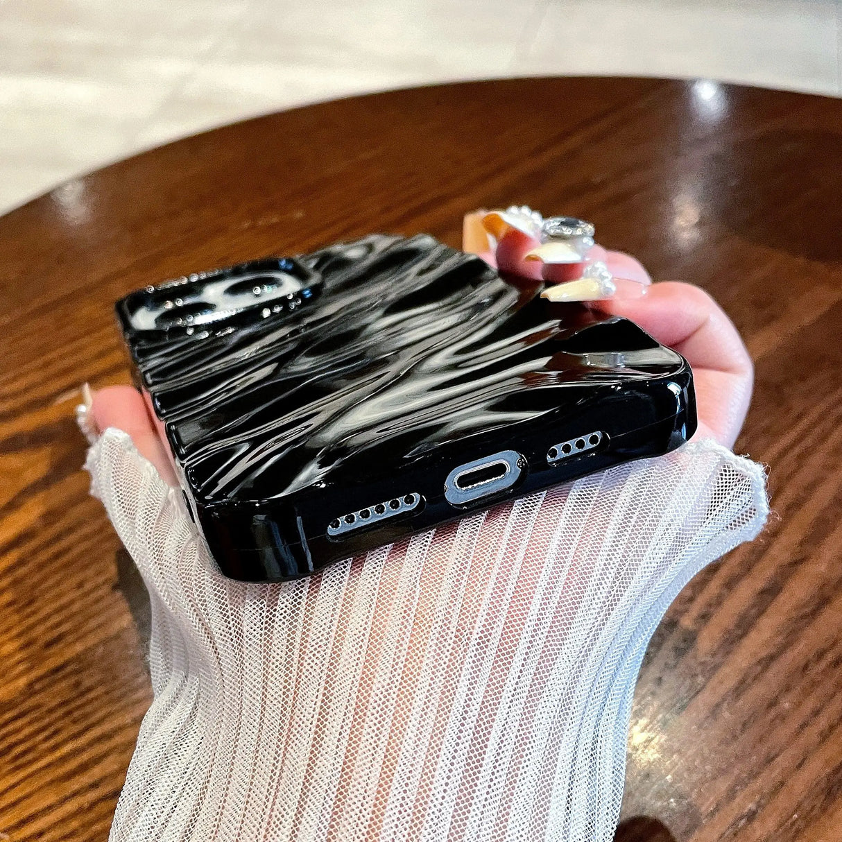 Black, textured phone case.