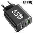 Black USB wall charger adapter with multiple ports labeled ’65W GaN’.