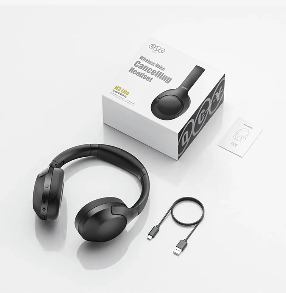 Black wireless noise-canceling headphones with charging cable and packaging.