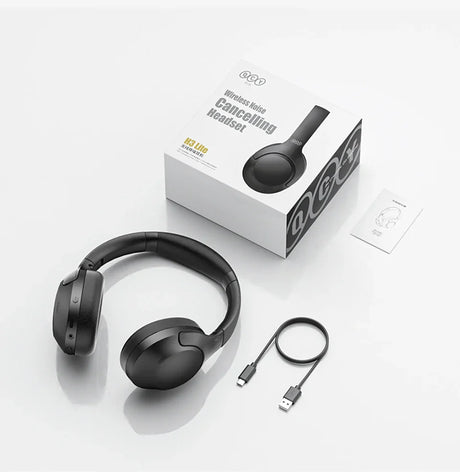 Black wireless noise-canceling headphones with charging cable and packaging.