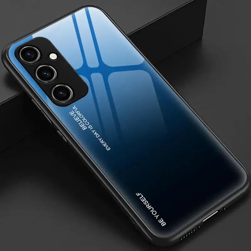 The back of a blue iphone case with the text,’be yourself ’