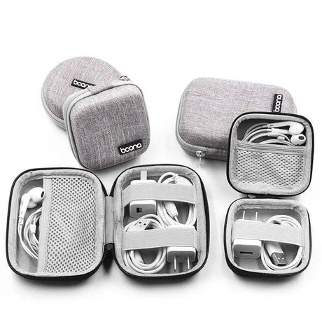 a set of four cases with earphones in them