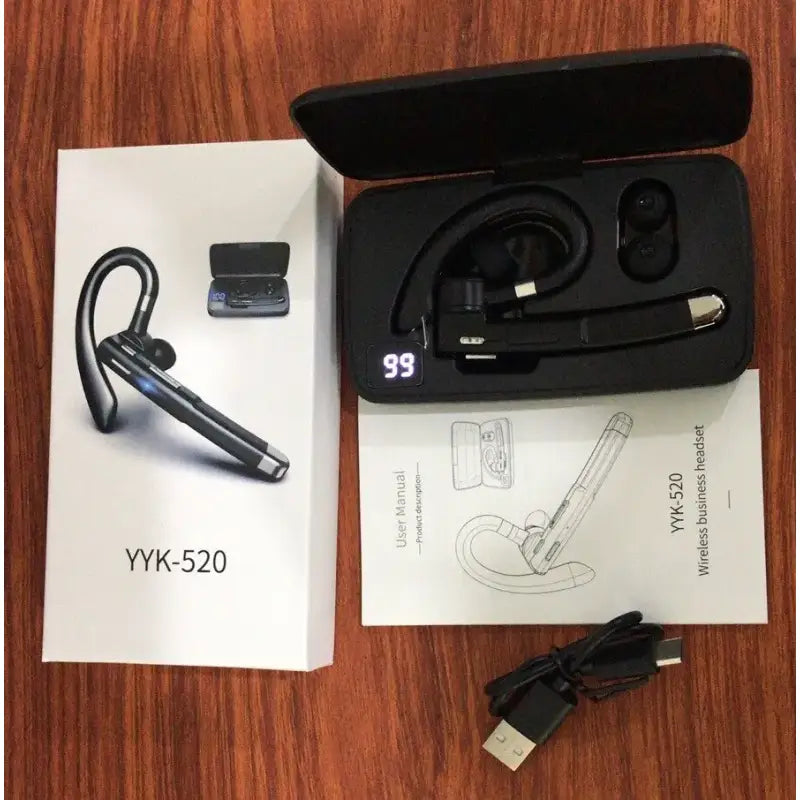 There is a box with a pair of ear buds and a charger