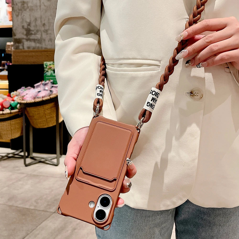 Brown phone case with braided strap.